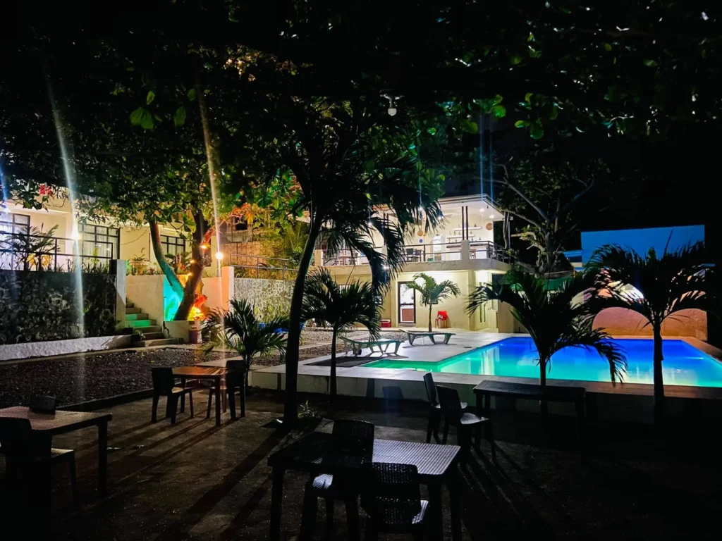 night , pool and trees