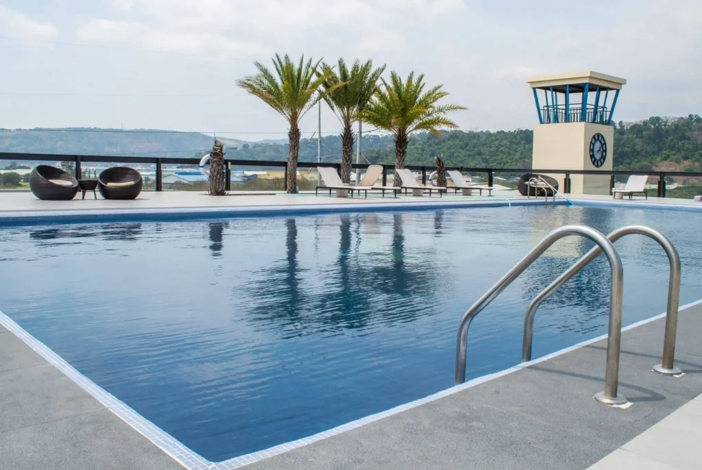 pool and sea view of Le Charmé Suites - Subic Beach Resort